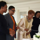 Dorothy Gilliam, the first African American female reporter in the Washington Post newsroom, celebrates her 80th birthday Monday at a party given by her daughters, Melissa, left, Leah and Stephanie. The event, attended by about 60 people, took place at the Hay-Adams hotel overlooking the White House. Gilliam was a Post editor and columnist, co-founder of the Maynard Institute for Journalism Education and president of the National Association of Black Journalists. (Credit: Mary Layton)
